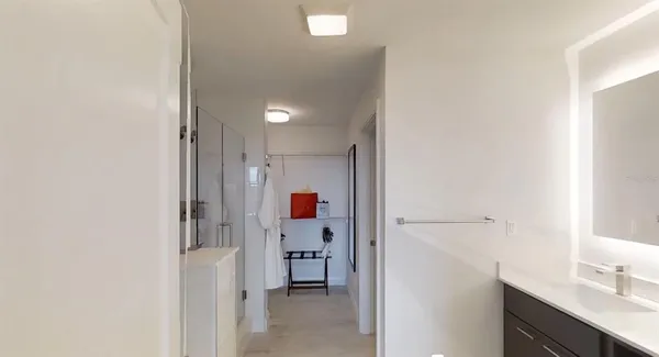 a view of a kitchen from the hallway