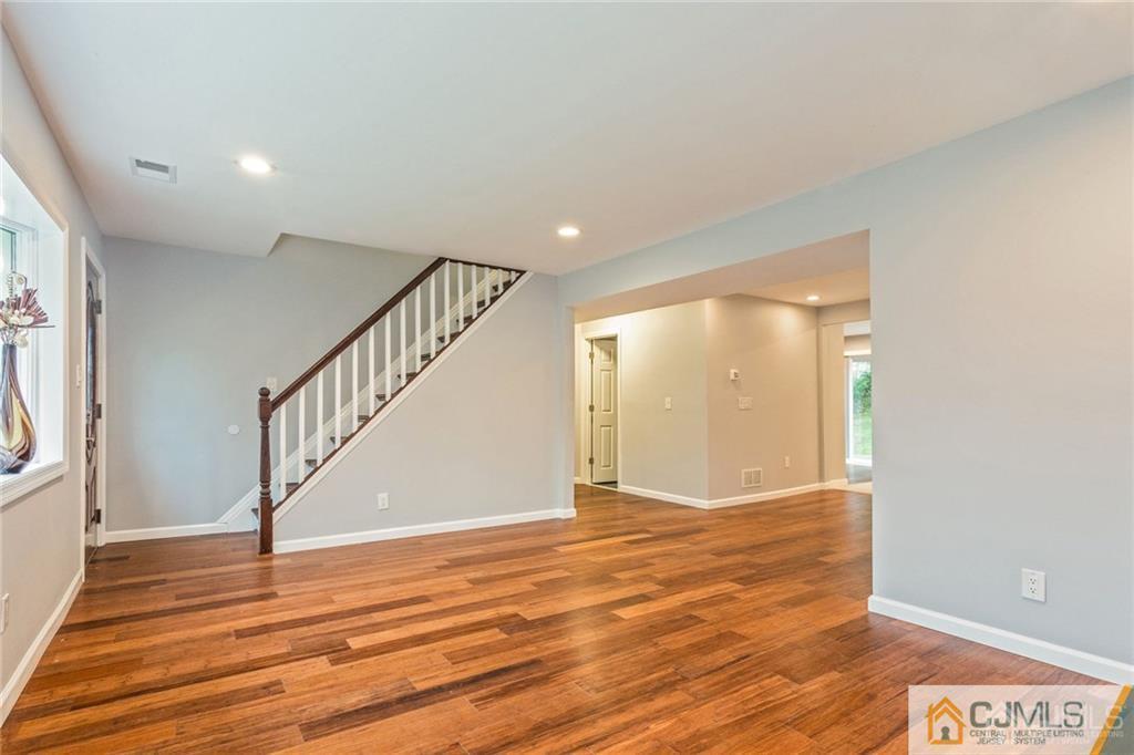 65 Tunison Road New Brunswick, NJ 08901 - Photo 4 of 22 a view of an entryway with wooden floor