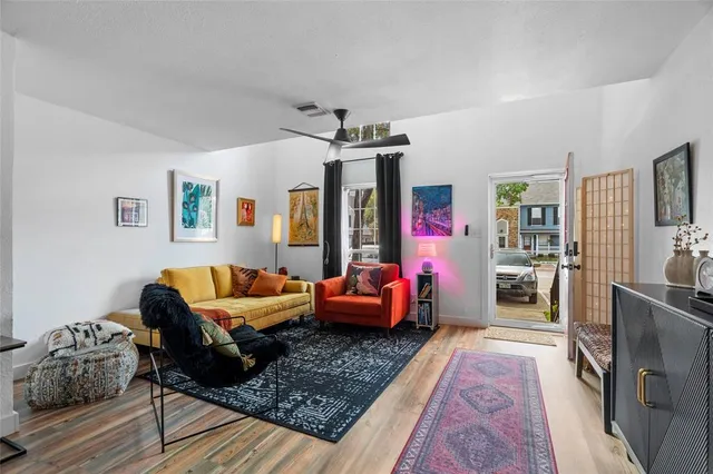 a kitchen with stainless steel appliances granite countertop a stove sink microwave and refrigerator