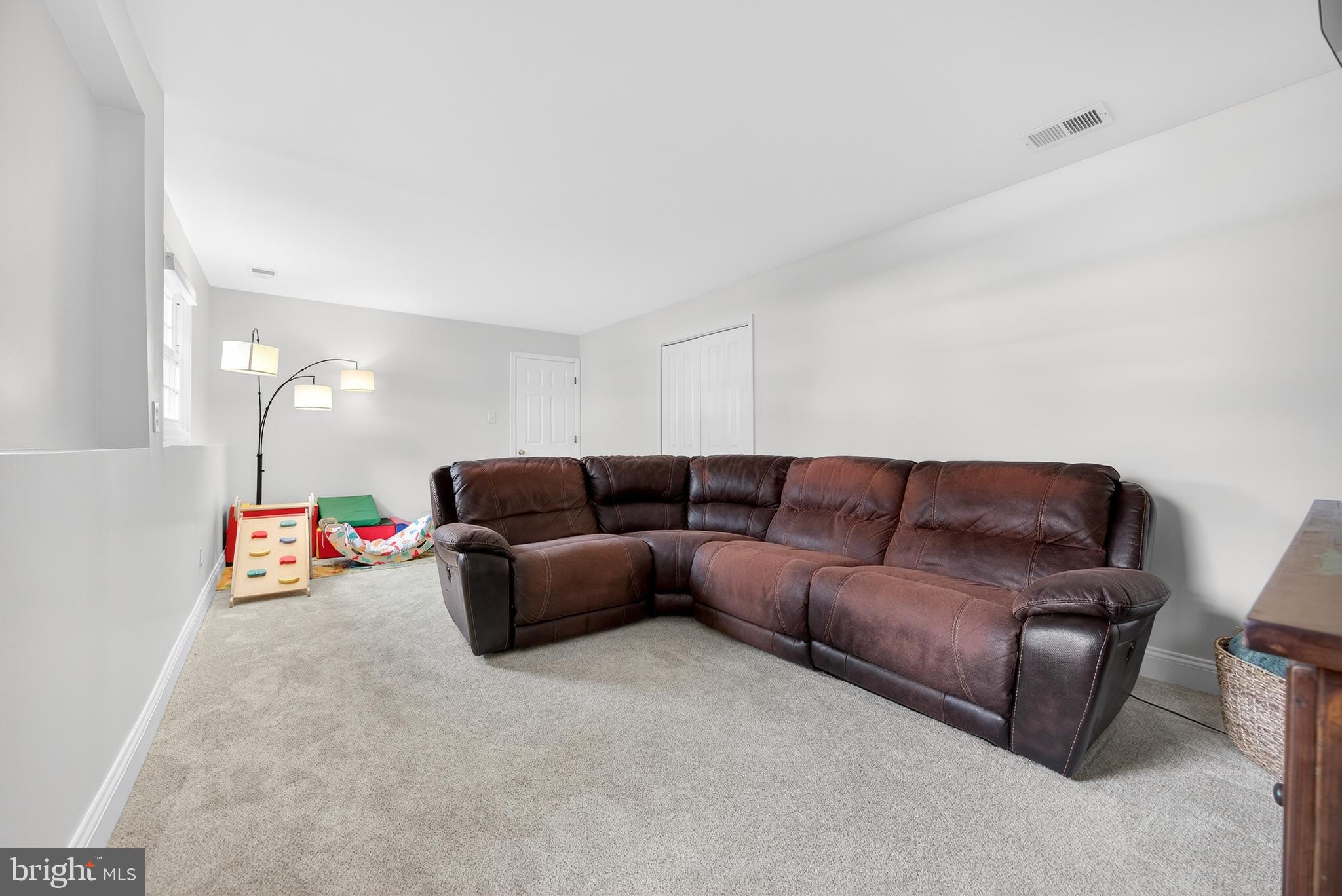 939 Shore Acres Road Arnold, MD 21012 - Photo 16 of 32 a living room with furniture and a couch