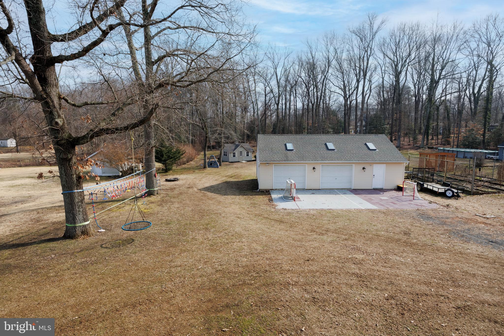 939 Shore Acres Road Arnold, MD 21012 - Photo 2 of 32 a view of a backyard with a tree