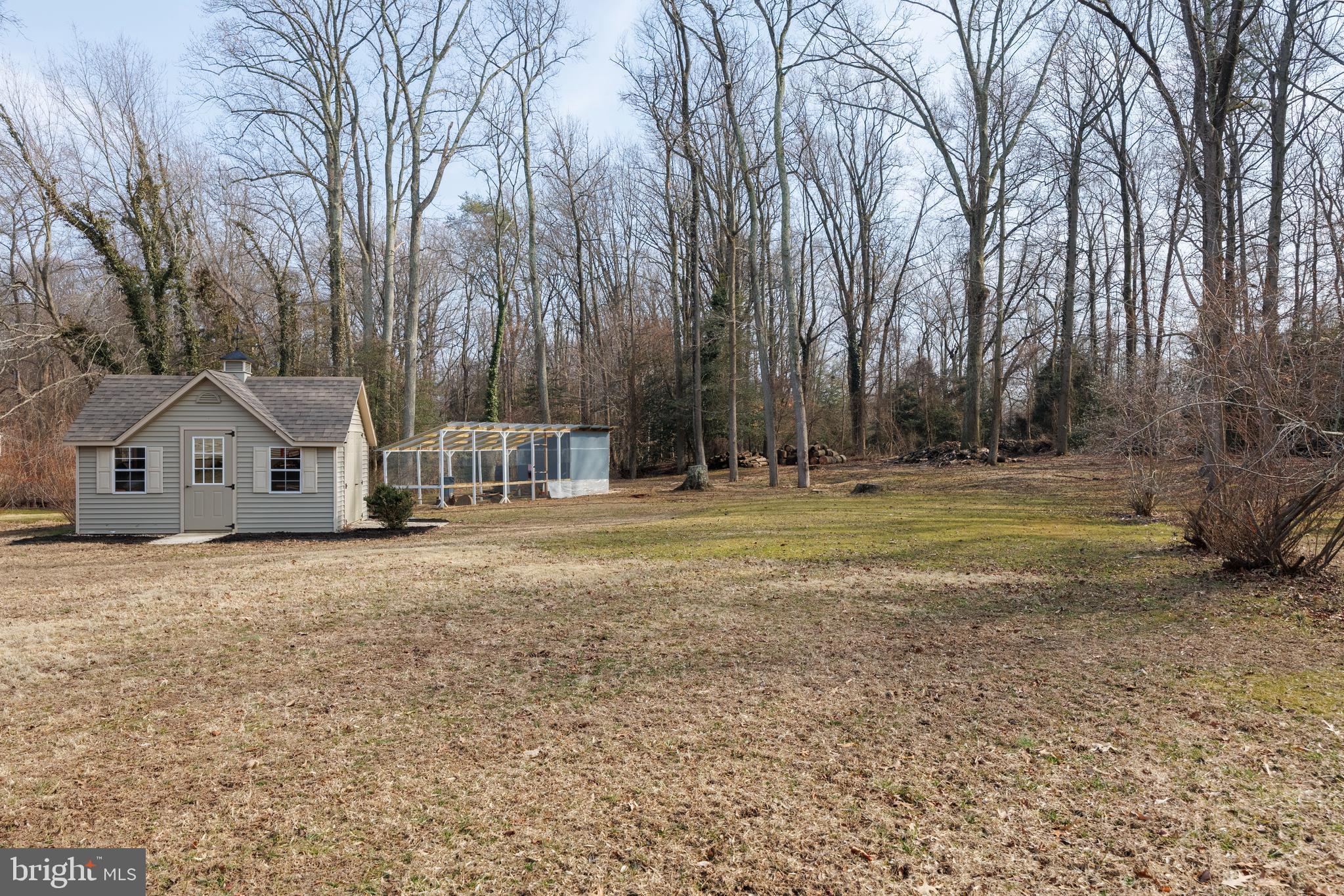 939 Shore Acres Road Arnold, MD 21012 - Photo 26 of 32 a view of a house with backyard and trees