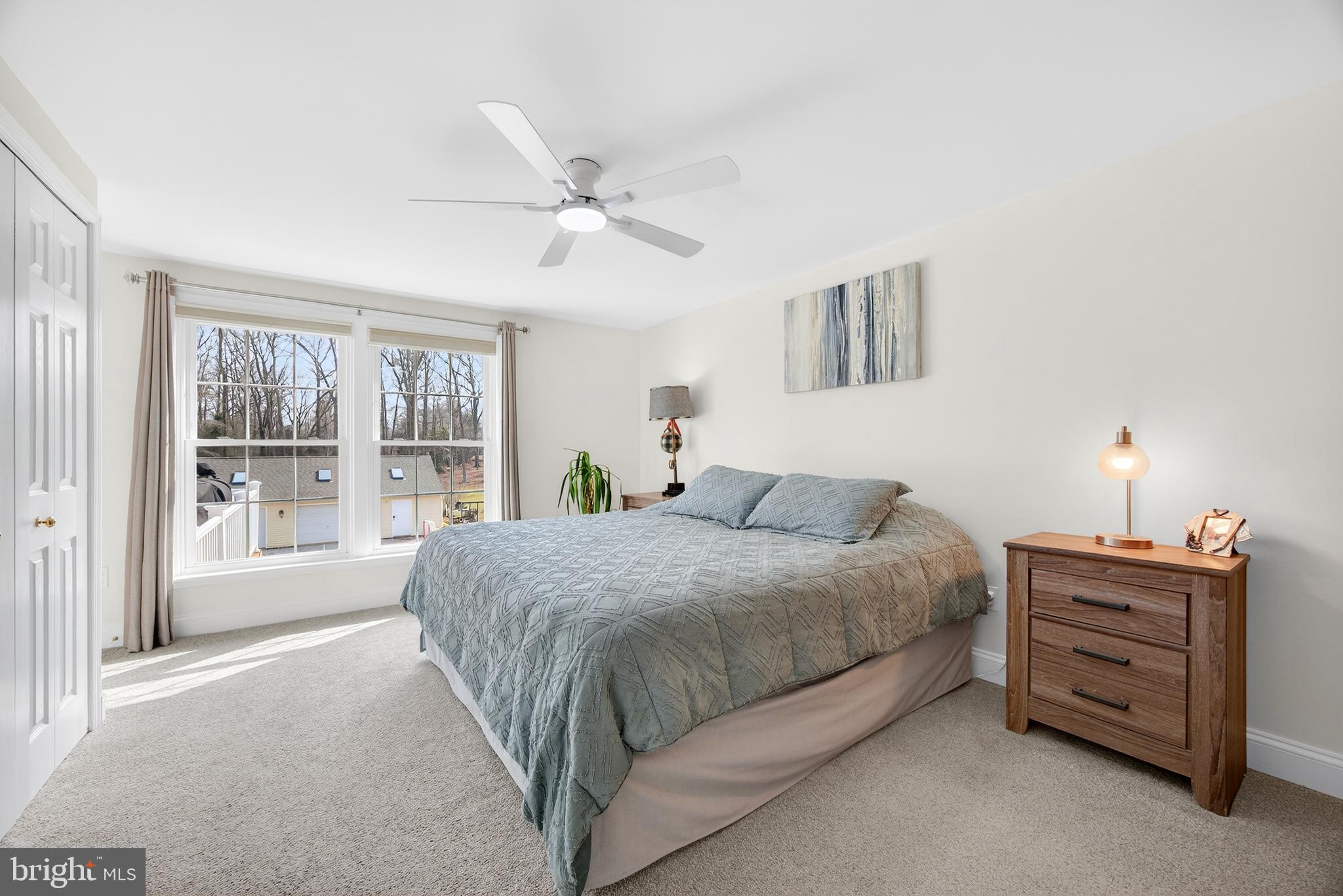 939 Shore Acres Road Arnold, MD 21012 - Photo 8 of 32 a bedroom with a bed and a window