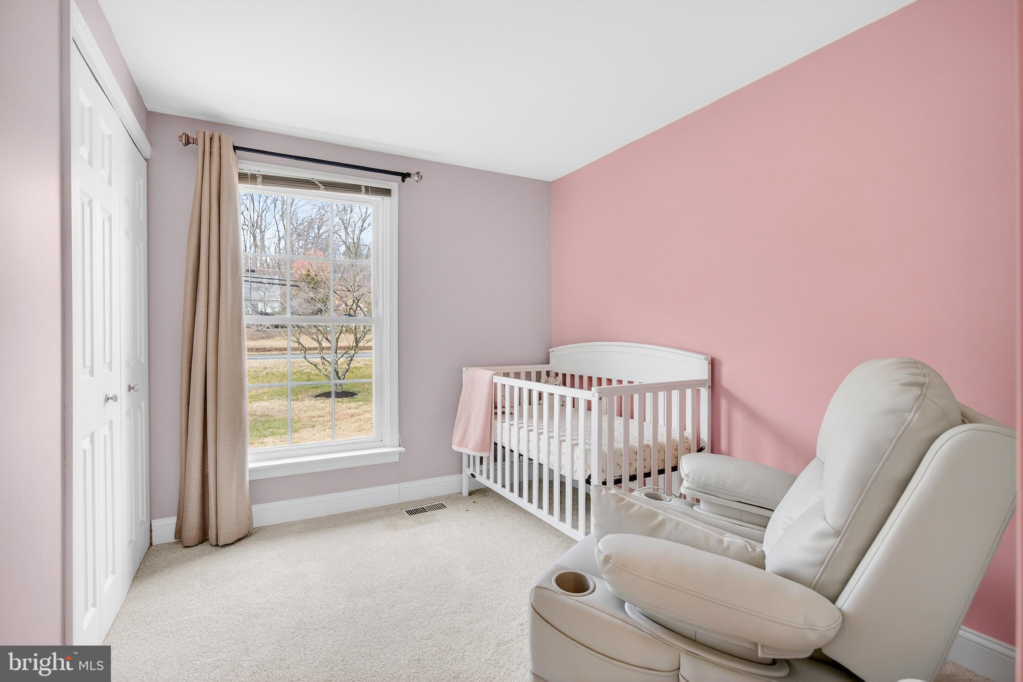 939 Shore Acres Road Arnold, MD 21012 - Photo 9 of 32 a bedroom with furniture and a window