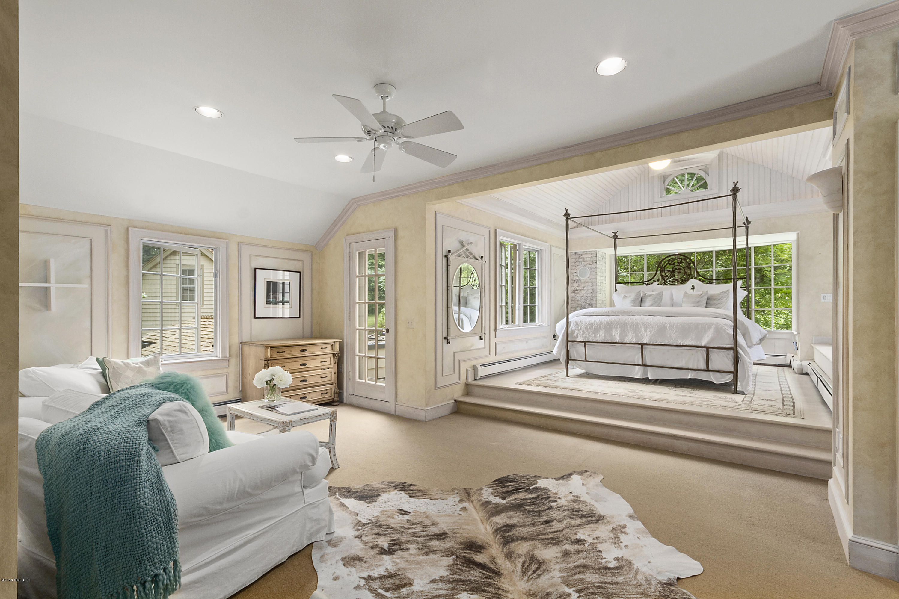 467 Laurel Road New Canaan, CT 06840 - Photo 15 of 29 a living room with furniture and a chandelier