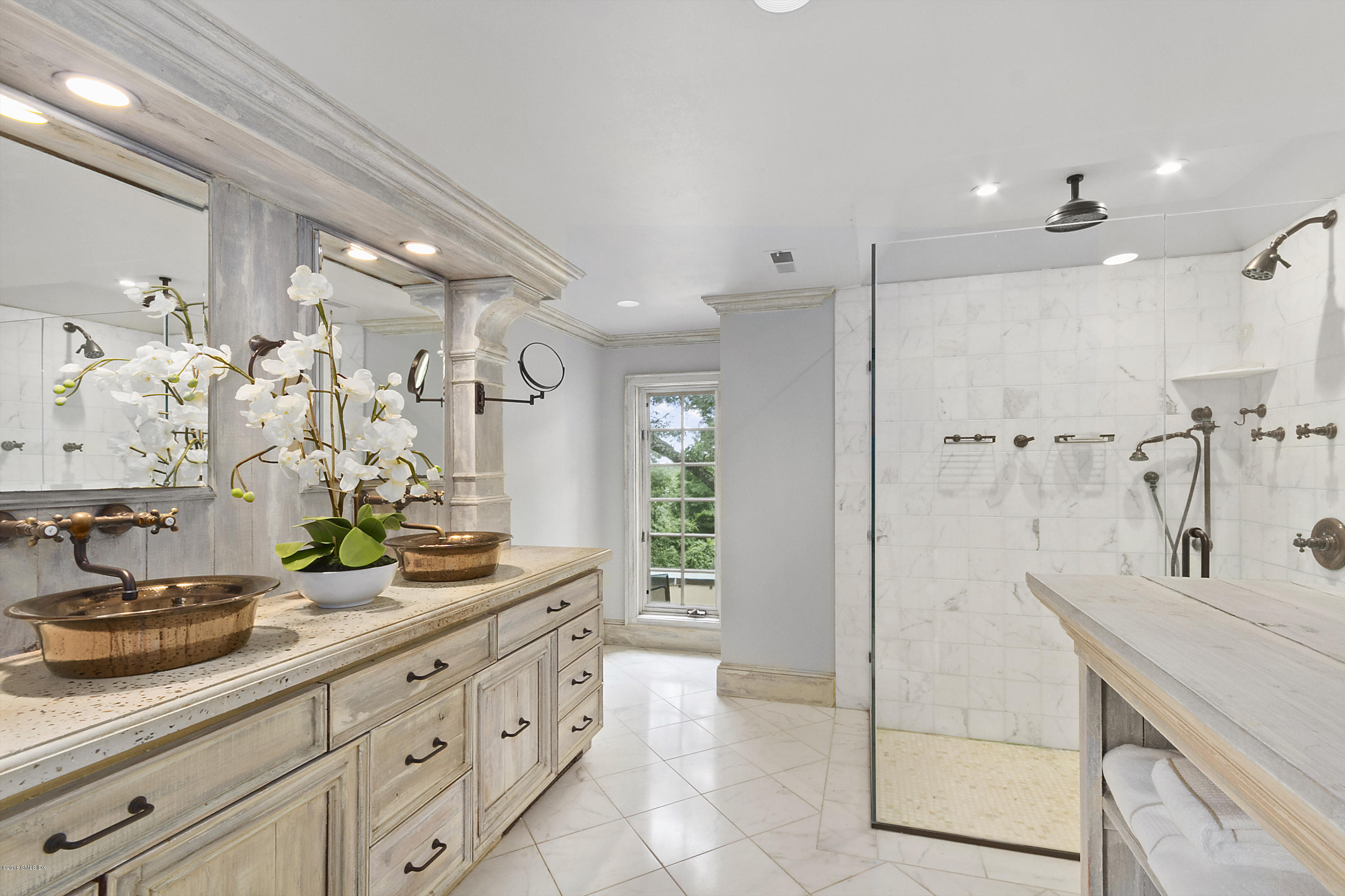 467 Laurel Road New Canaan, CT 06840 - Photo 16 of 29 a spacious bathroom with double sink and shower