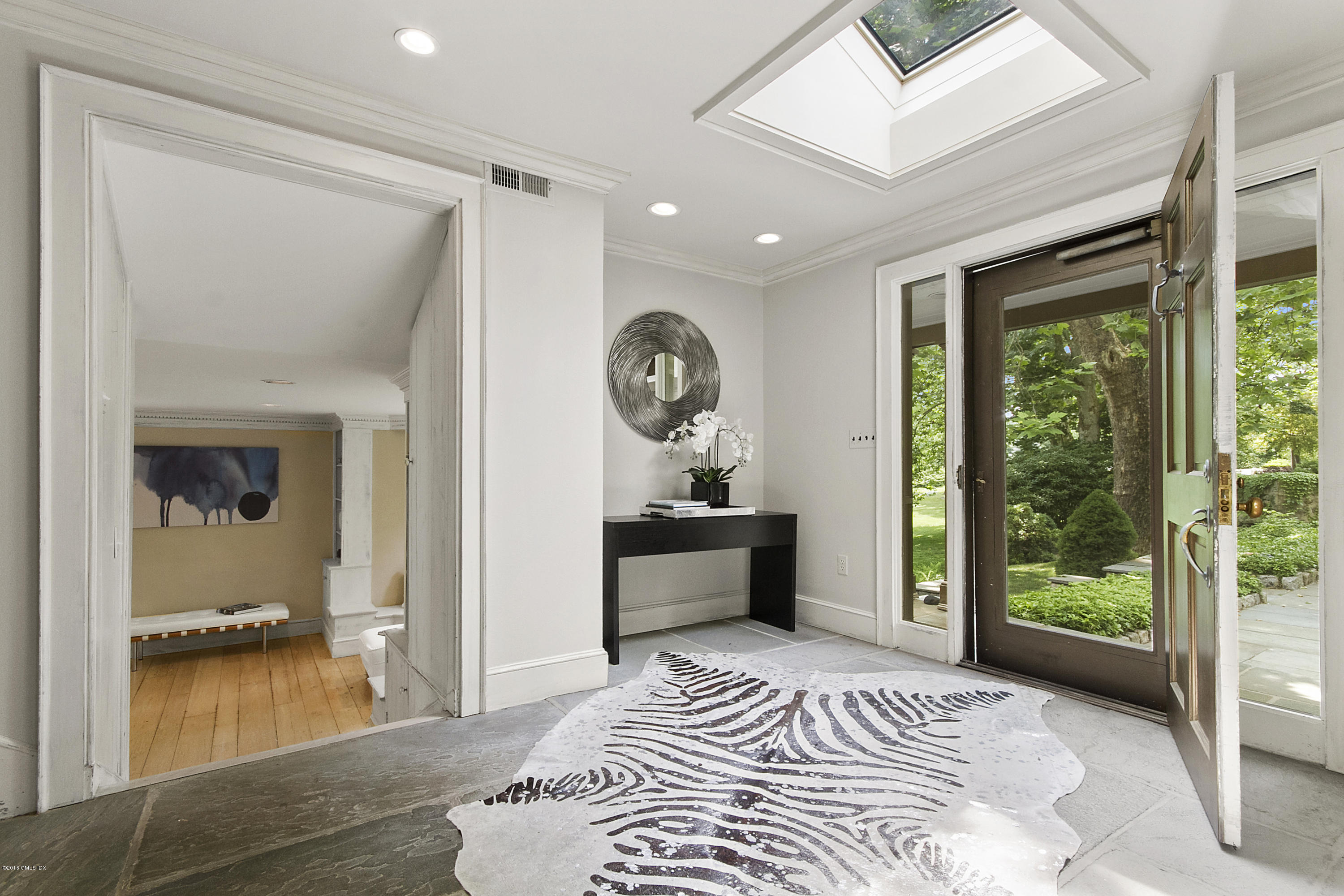 467 Laurel Road New Canaan, CT 06840 - Photo 2 of 29 a bedroom with a bed and a window