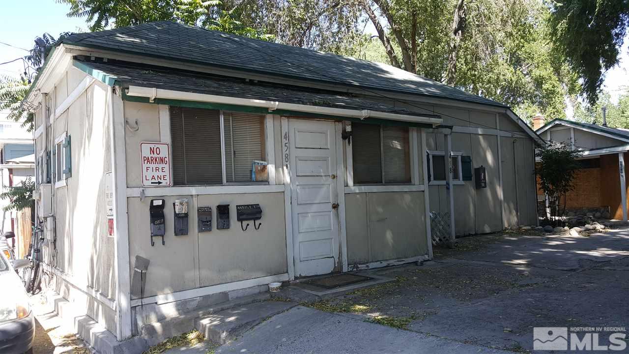 458 East 7th Street Reno, NV 89512 - Photo 1 of 2 a view of a small house with large windows and a small yard