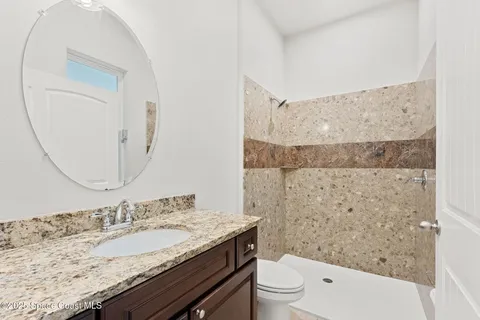 a view of a swimming pool with a yard