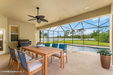 a view of a swimming pool with a lounge chairs