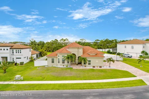 a house with yard in front of it