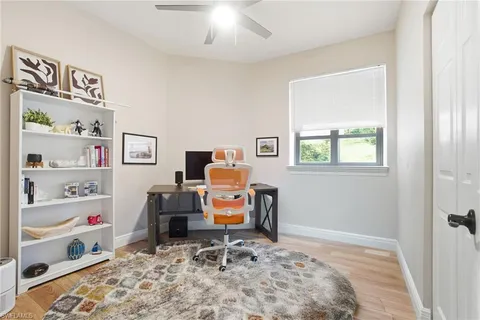 a view of a workspace with furniture and toys