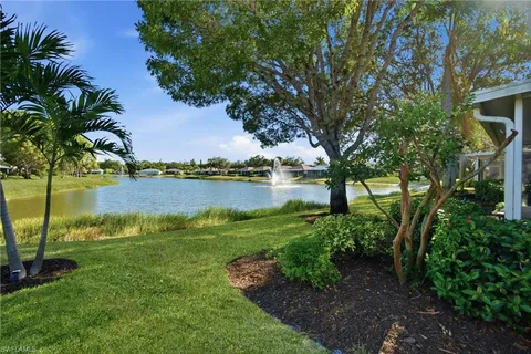 a view of a lake with a big yard