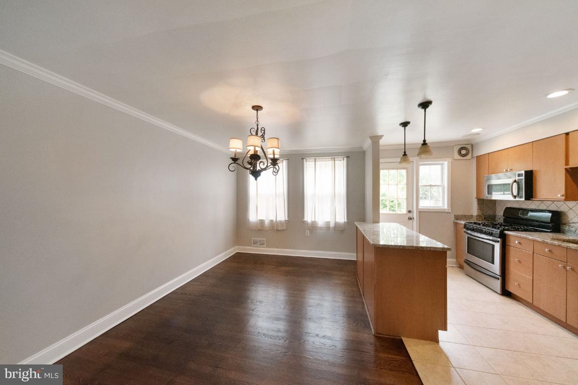 1642 Thetford Road Baltimore, MD 21286 - Photo 6 of 21 Dining room and kitchen