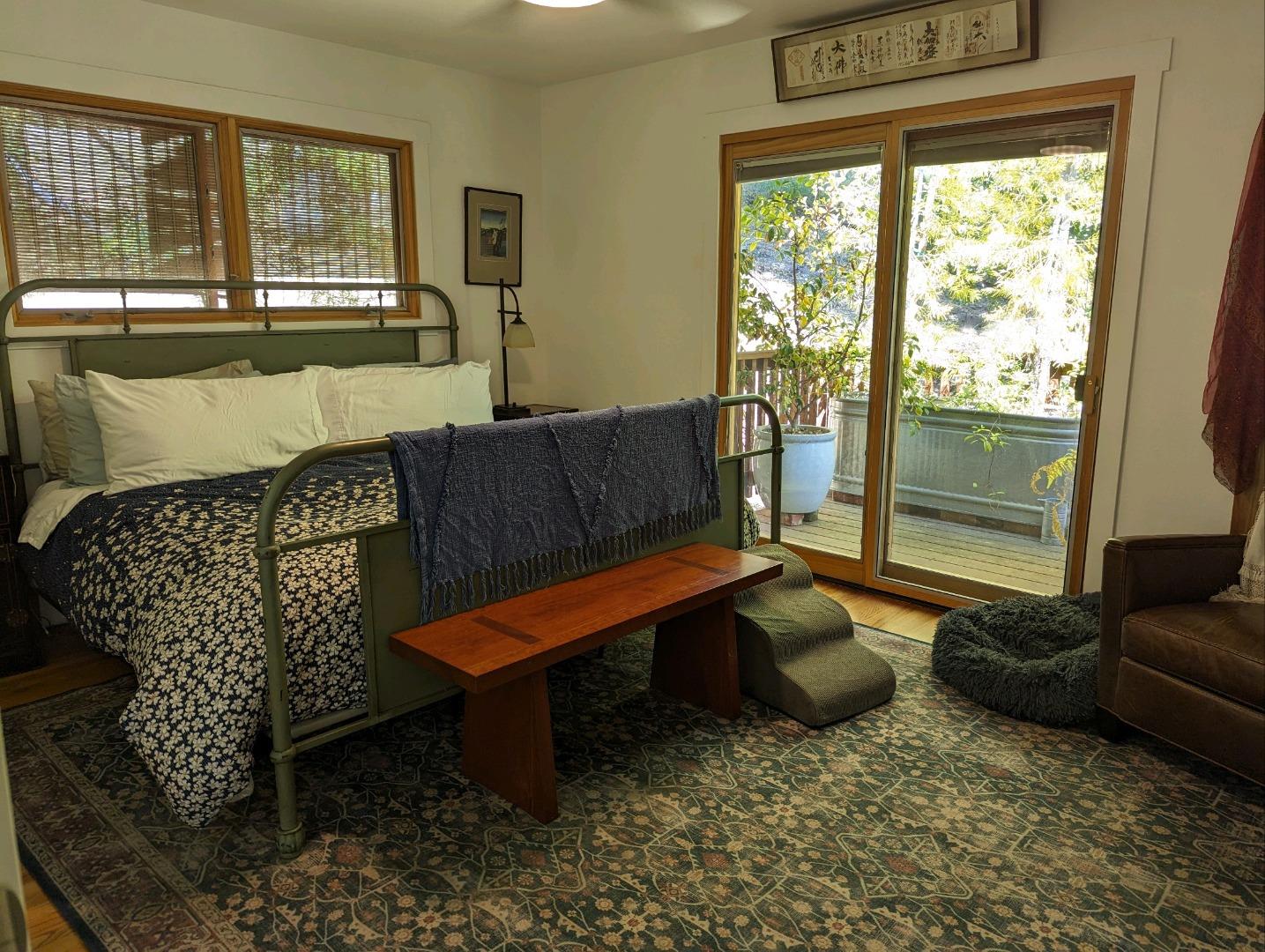 113 Foxwood Road Portola Valley, CA 94028 - Photo 7 of 9 a living room with furniture and a window