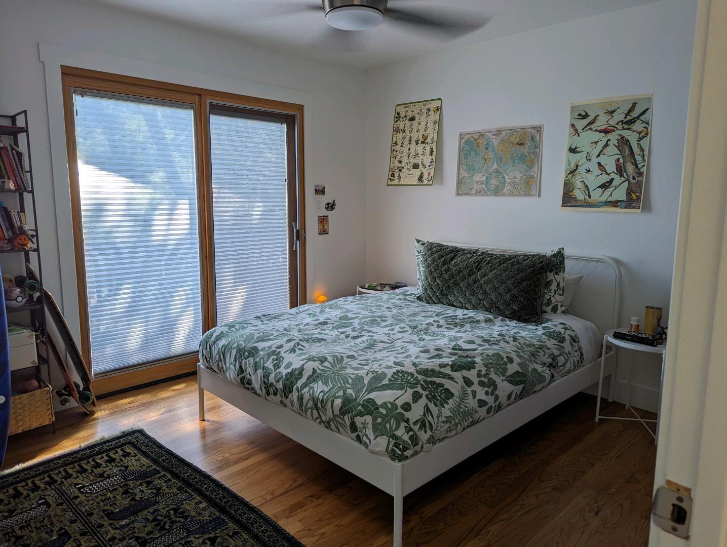 113 Foxwood Road Portola Valley, CA 94028 - Photo 8 of 9 a bed sitting in a bedroom next to a window