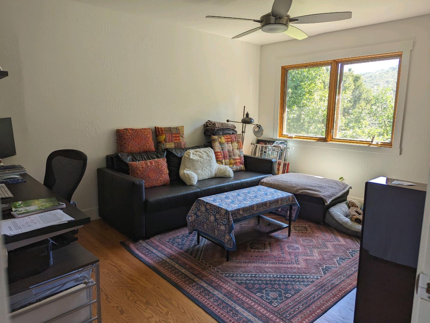 113 Foxwood Road Portola Valley, CA 94028 - Photo 9 of 9 a living room with furniture and a rug