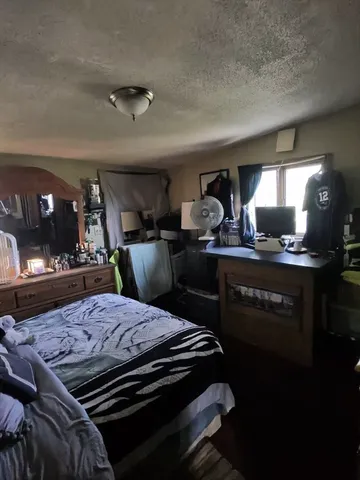 a view of a hallway with closet area