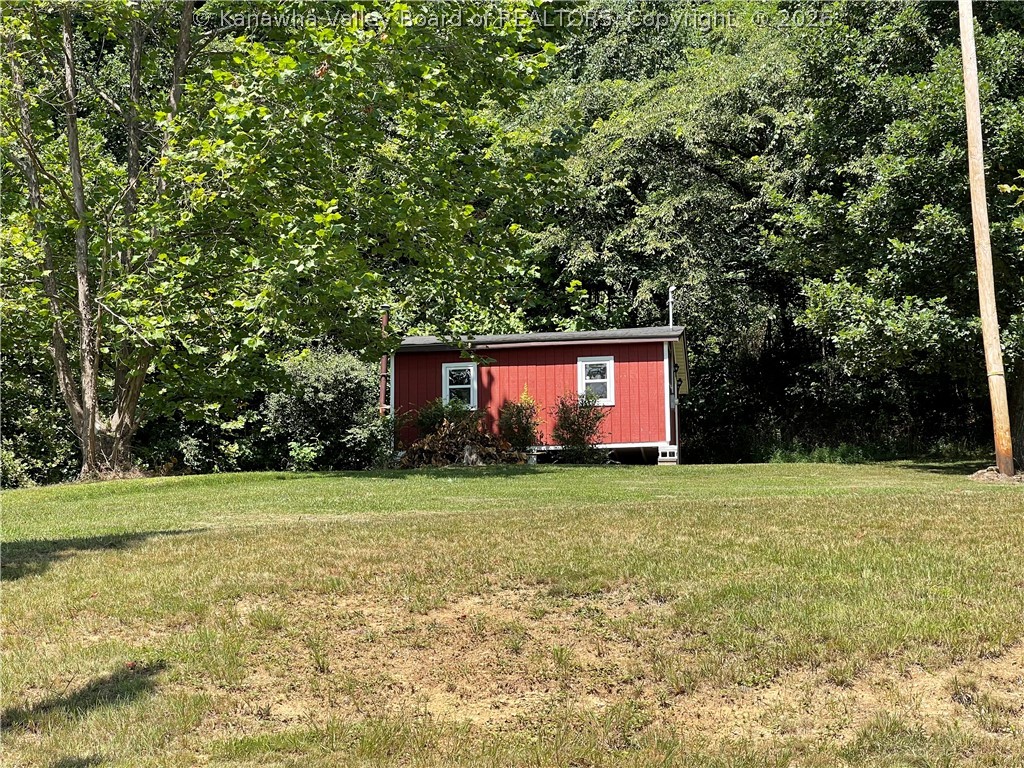 3193 Rayburn Road Point Pleasant, WV 25550 - Photo 21 of 23 Man Cave 16x20, insulated, partially finished has a woodburner