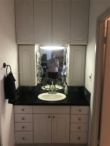 a view of a living room and dining room