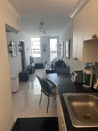 a kitchen with a stove and a microwave