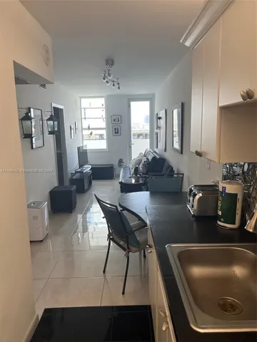 a kitchen with a stove and a microwave