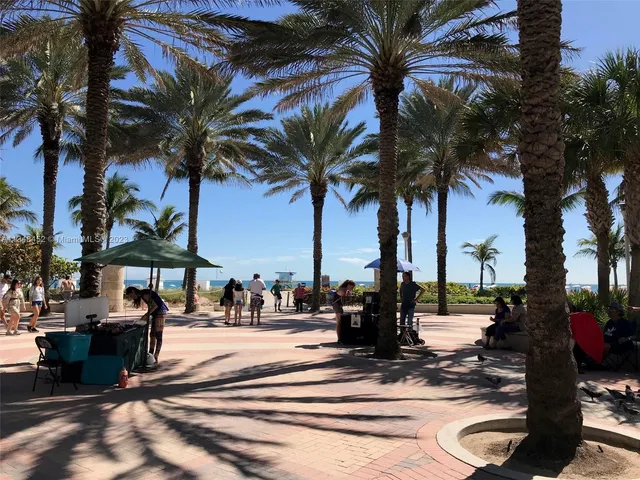 a view of a refrigerator in a kitchen