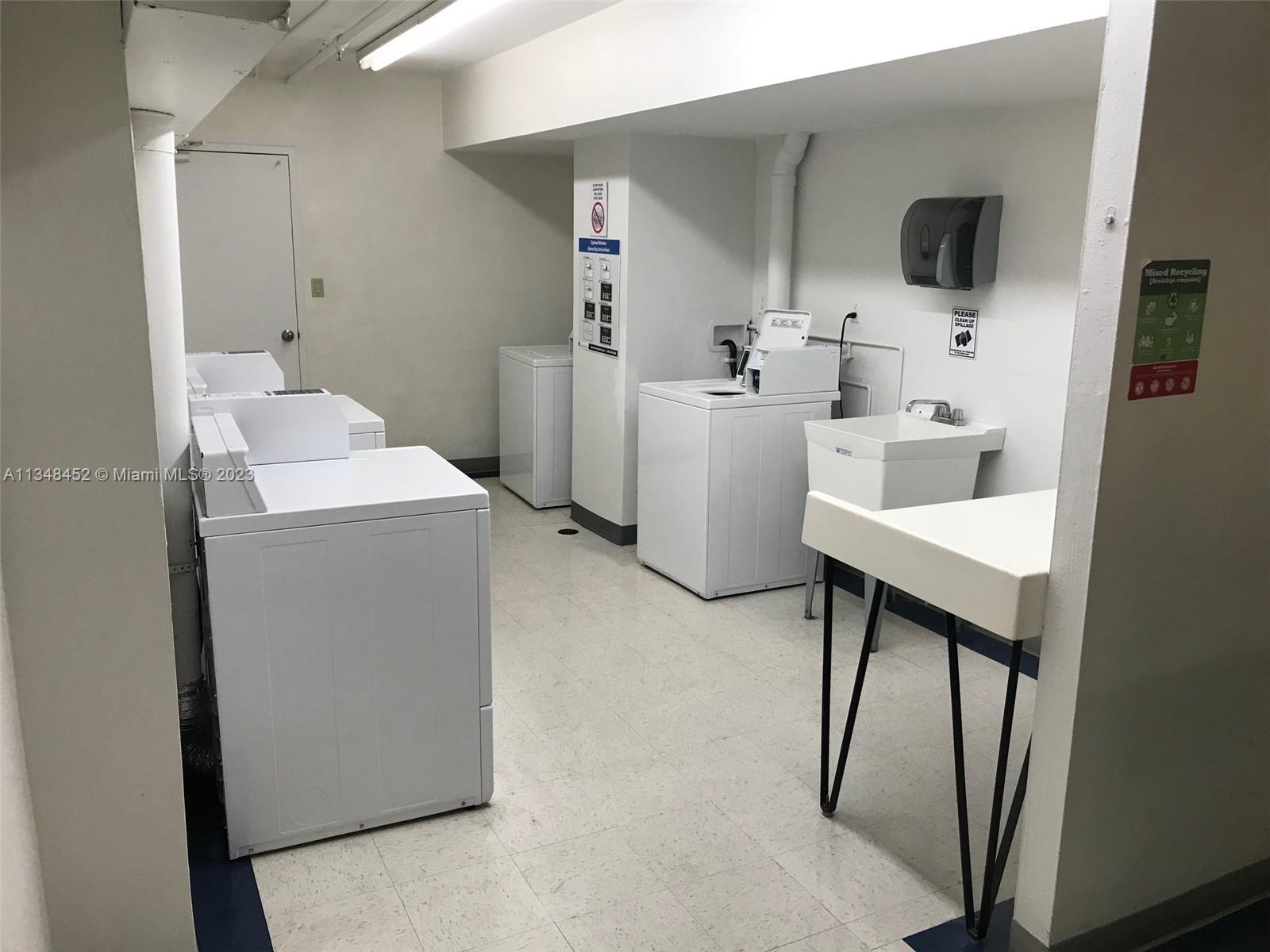 100 Lincoln Road, Unit 1007 Miami Beach, FL 33139 - Photo 38 of 80 a bathroom with a sink toilet and mirror