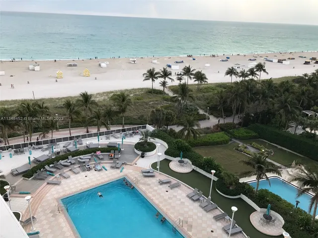 a room with gym equipment and a large window