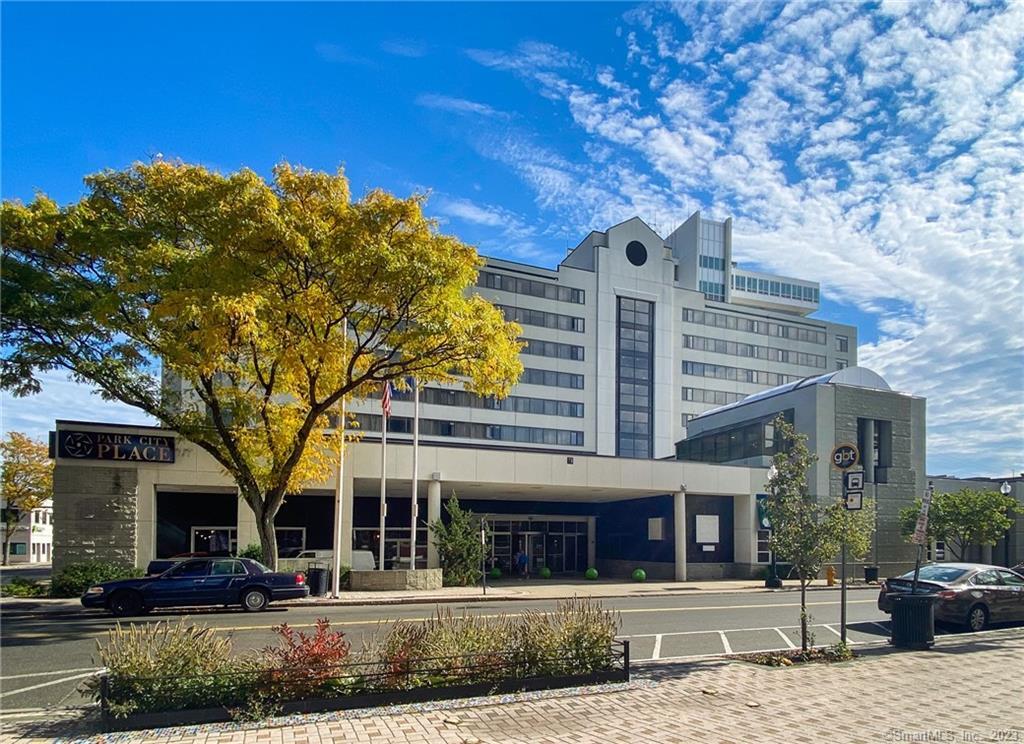 a front view of a building with garden