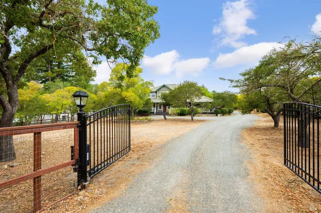 a view of street and small yard