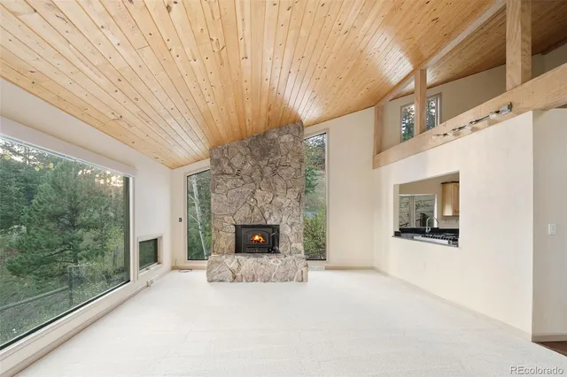 a view of a hallway with a fireplace