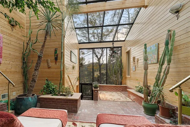 a view of balcony with furniture