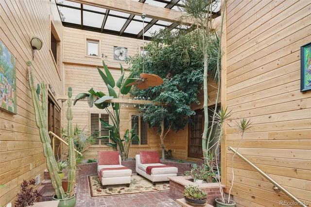 a view of entryway with a tree
