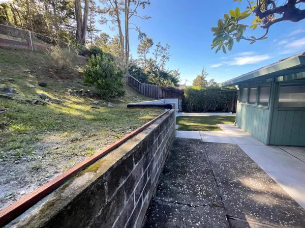 a view of swimming pool with a yard