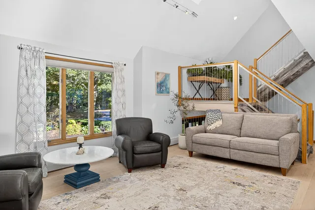 a kitchen with stainless steel appliances granite countertop a stove and a refrigerator