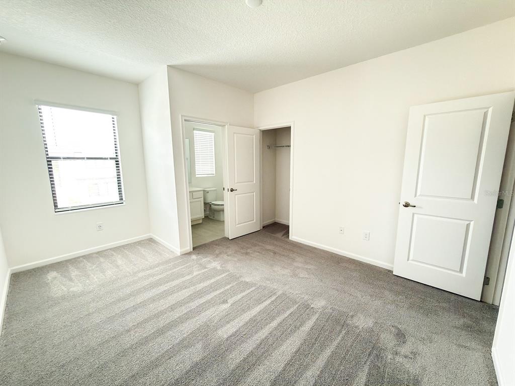 1295 Butterfly Orchid Road Davenport, FL 33837 - Photo 14 of 60