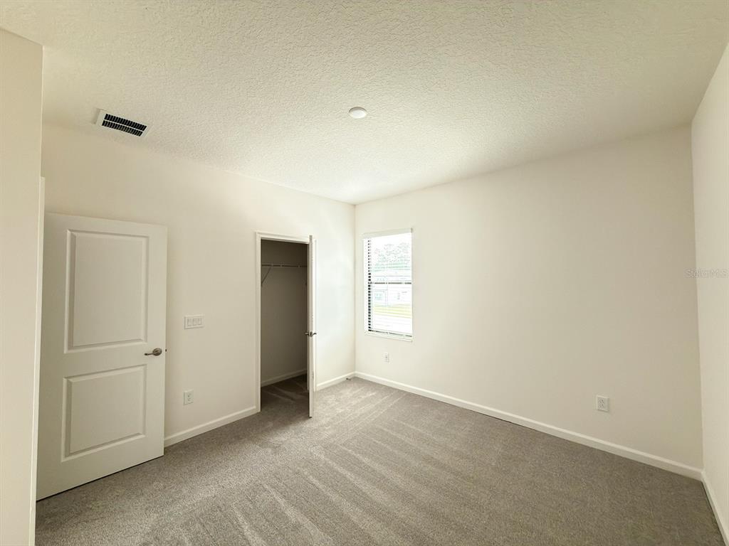 1295 Butterfly Orchid Road Davenport, FL 33837 - Photo 18 of 60