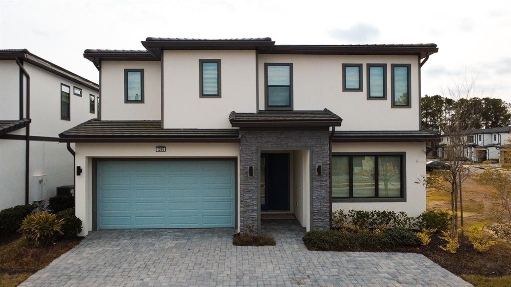 1295 Butterfly Orchid Road Davenport, FL 33837 - Photo 2 of 60