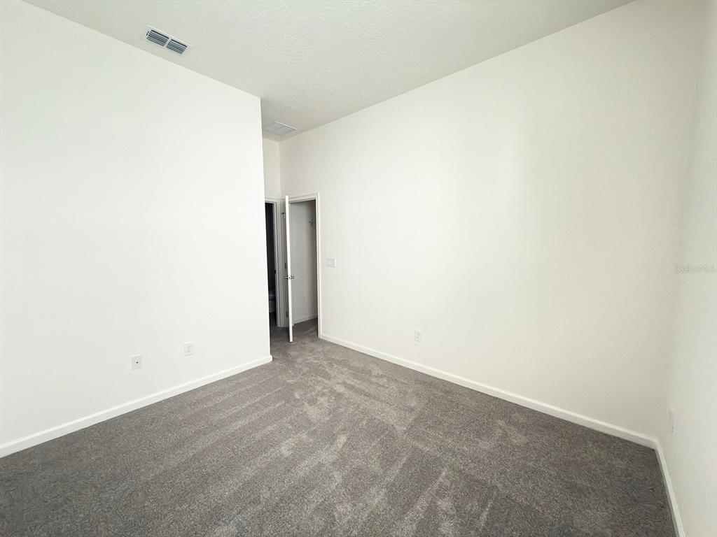 1295 Butterfly Orchid Road Davenport, FL 33837 - Photo 32 of 60