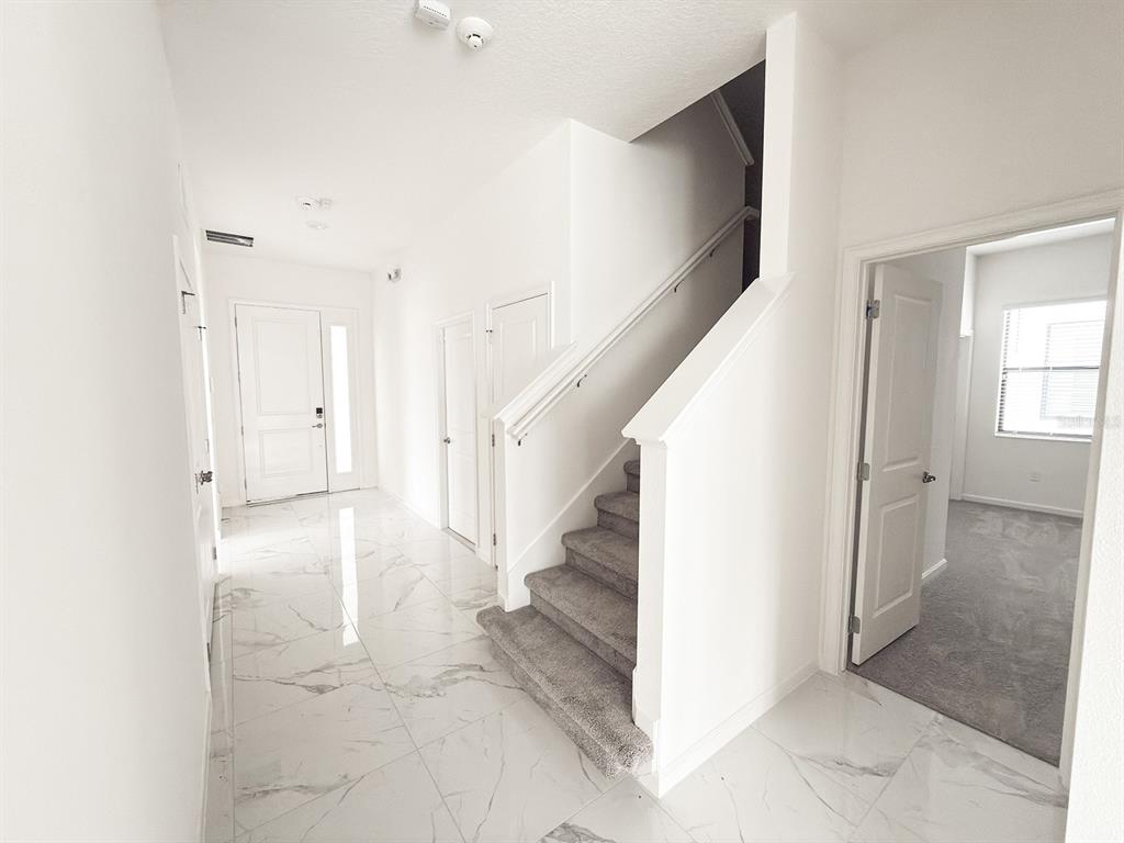 1295 Butterfly Orchid Road Davenport, FL 33837 - Photo 7 of 60