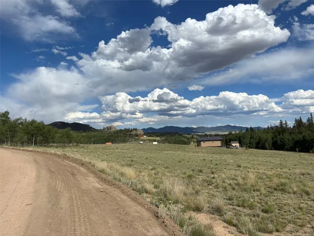 a view of a lake with a big yard