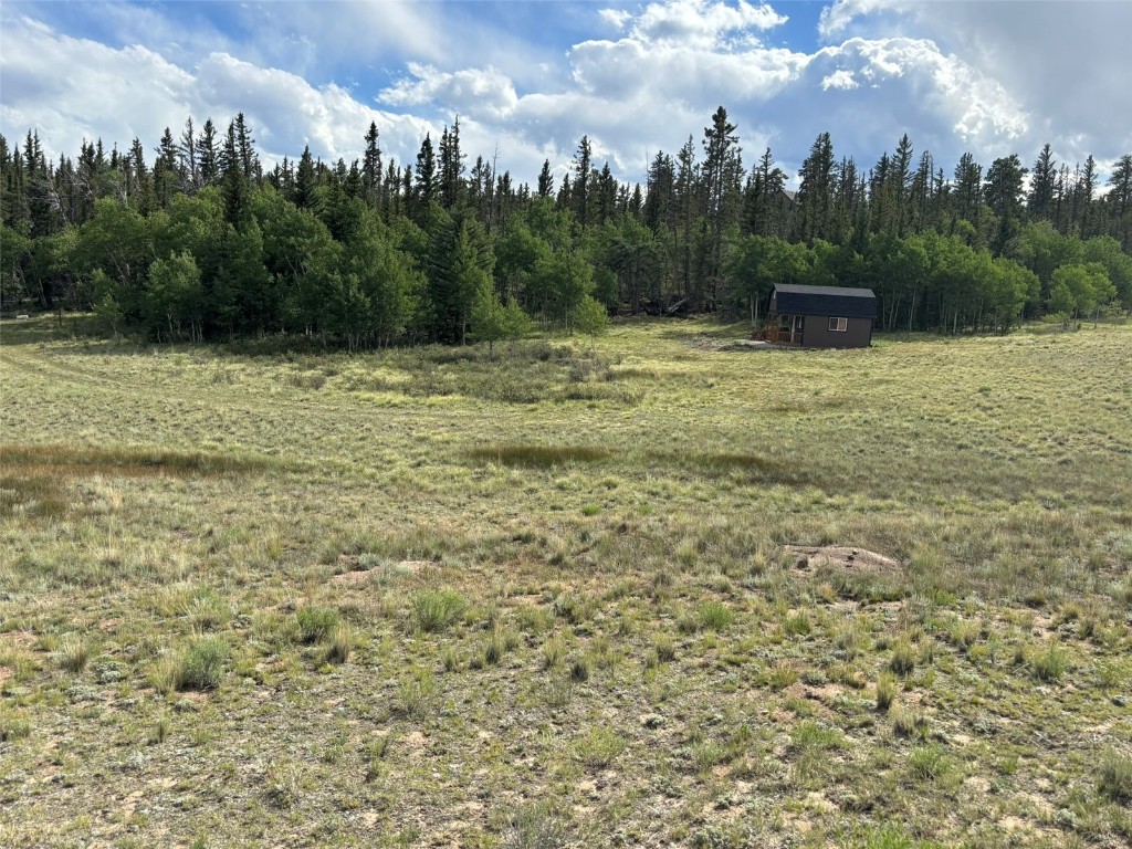702 Pinto Trail Como, CO 80432 - Photo 3 of 20 a backyard of a house with lots of green space