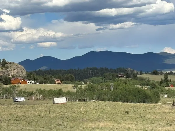 a view of lake with mountain