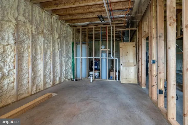 a aerial view of a house with a yard and balcony