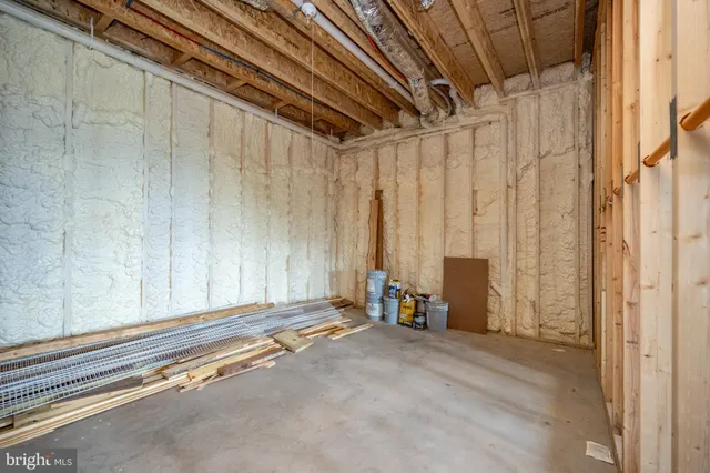 a view of house with a yard