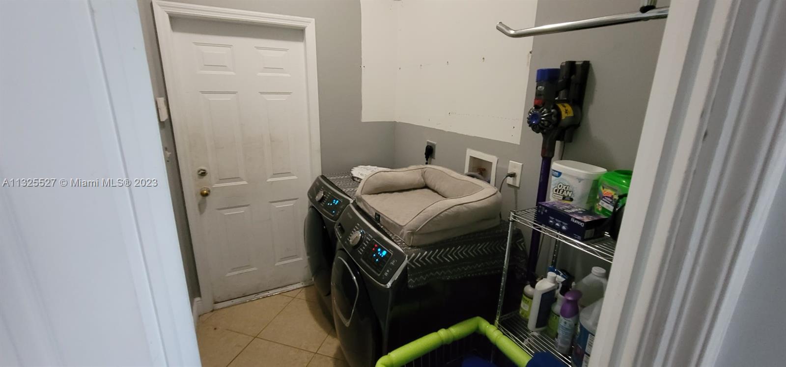 20565 Southwest 326th Street Homestead, FL 33030 - Photo 16 of 28 a utility room with dryer and washer