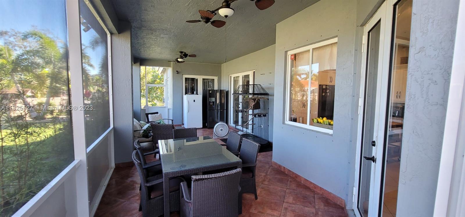 20565 Southwest 326th Street Homestead, FL 33030 - Photo 18 of 28 a dining room with furniture and window