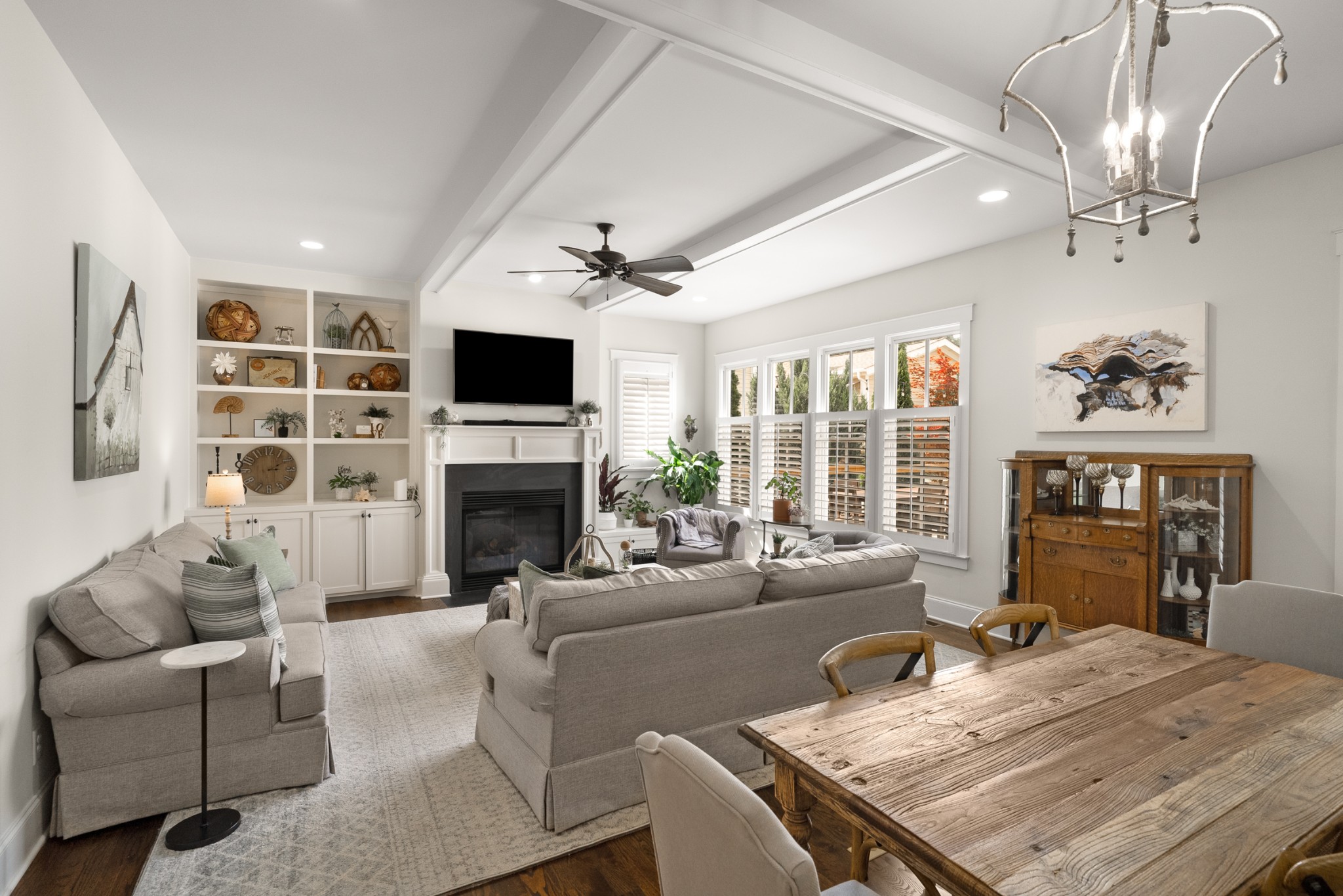 412 Boyd Mill Avenue Franklin, TN 37064 - Photo 17 of 53 a living room with furniture a fireplace and a large window