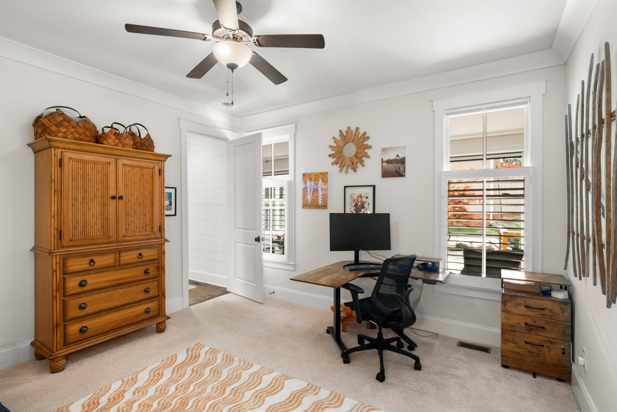 412 Boyd Mill Avenue Franklin, TN 37064 - Photo 29 of 53 a view of a workspace with furniture and a window